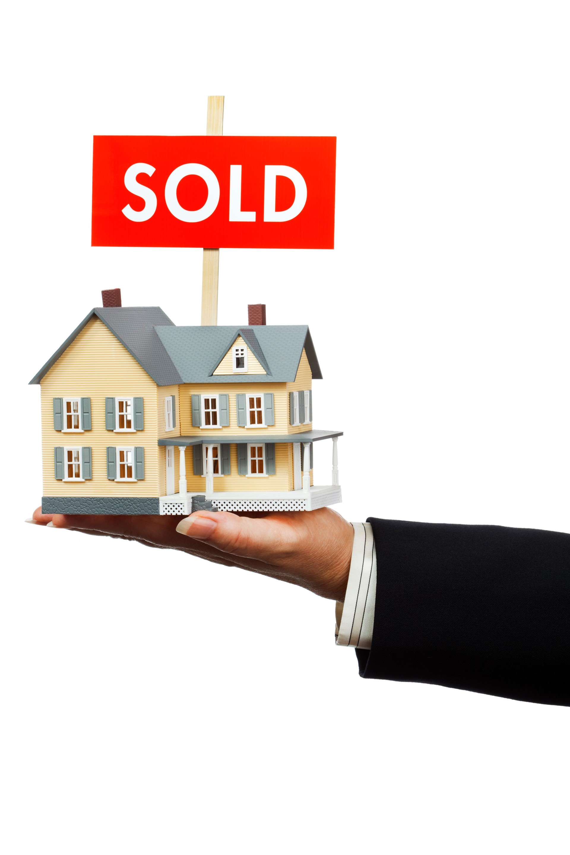 Hand Offering Real Estate with SOLD Sign on White Background