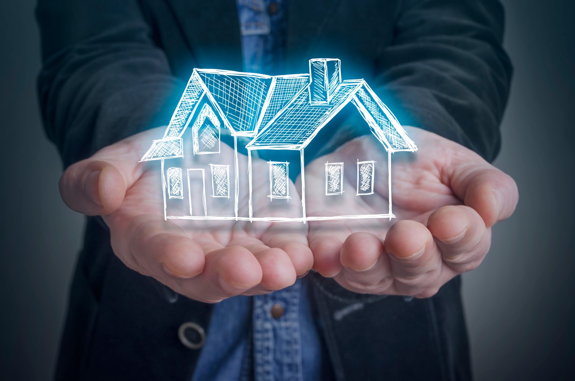 Architect with a virtual model of a house