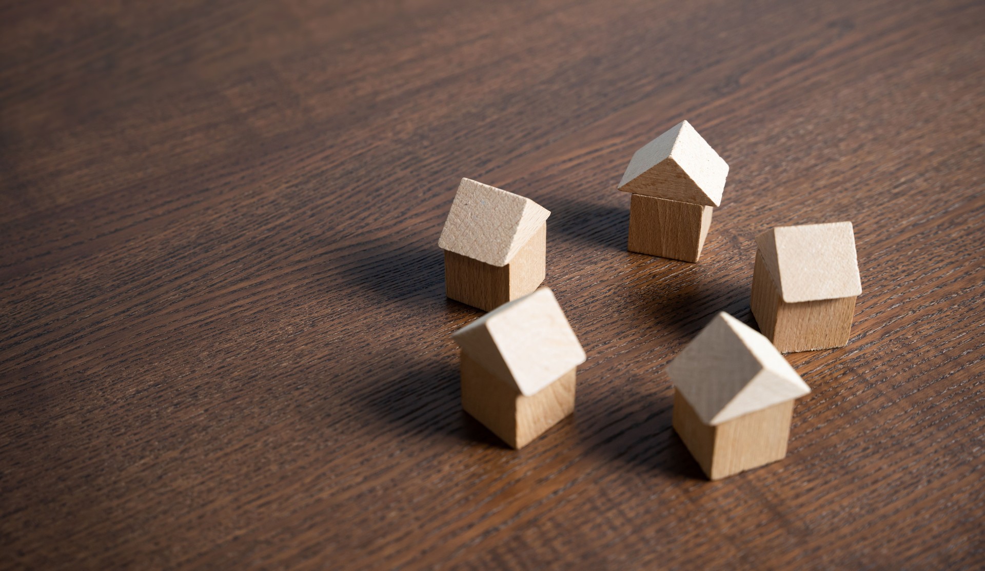 Circle of houses figures. Community of homeowners.