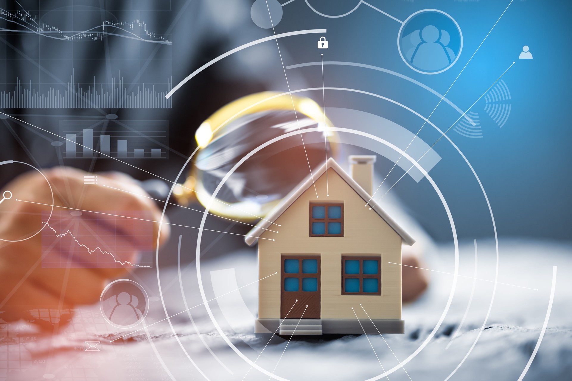 Businessman Holding Magnifying Glass Over House Model